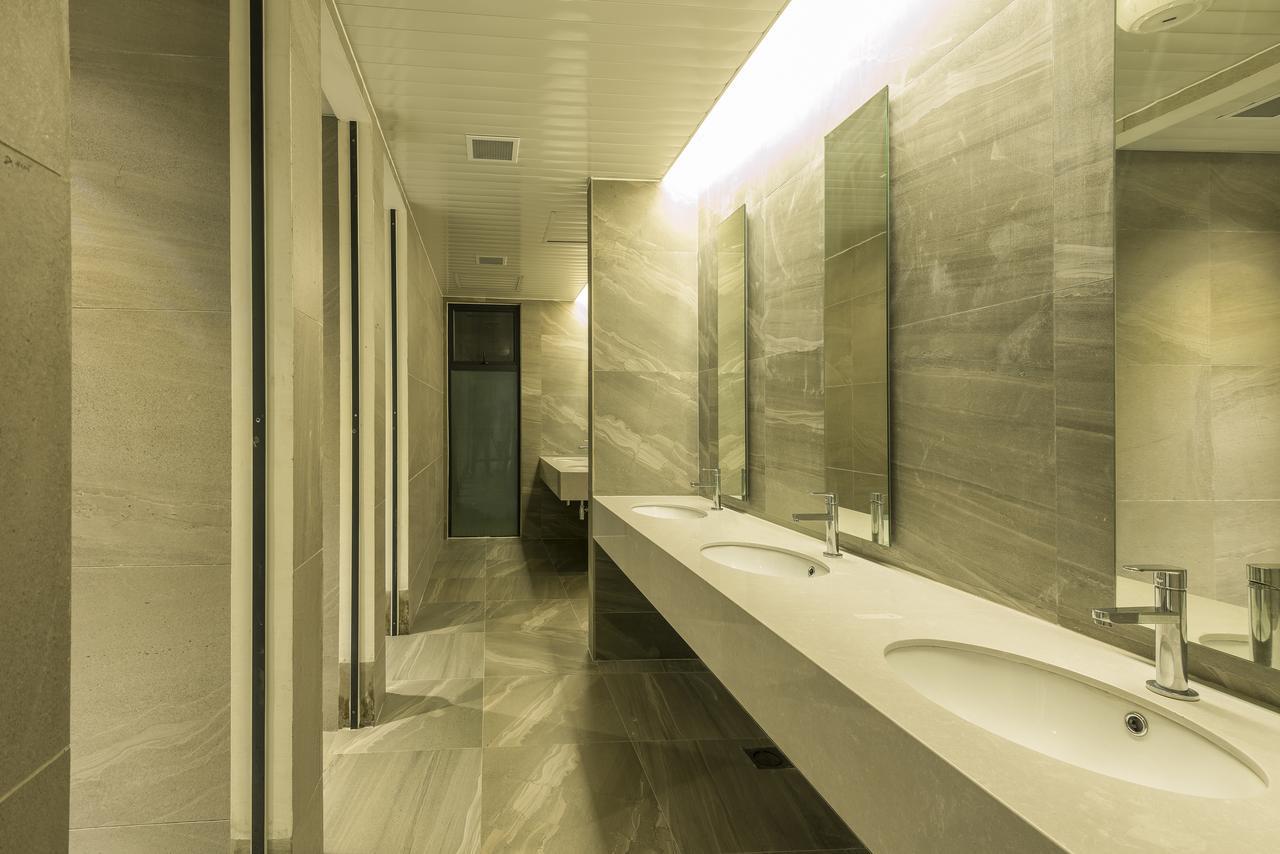 Jinhold Hotel & Serviced Apartment Мири Экстерьер фото