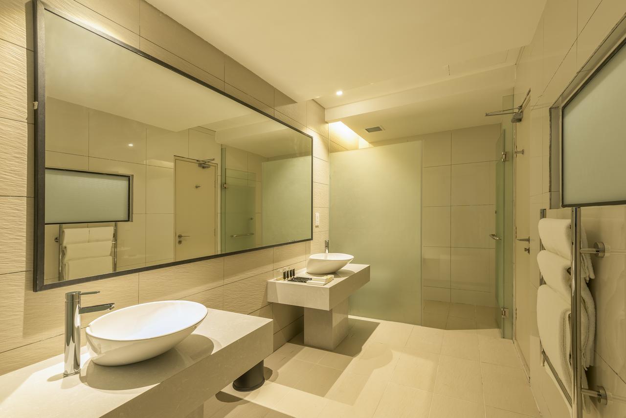 Jinhold Hotel & Serviced Apartment Мири Экстерьер фото