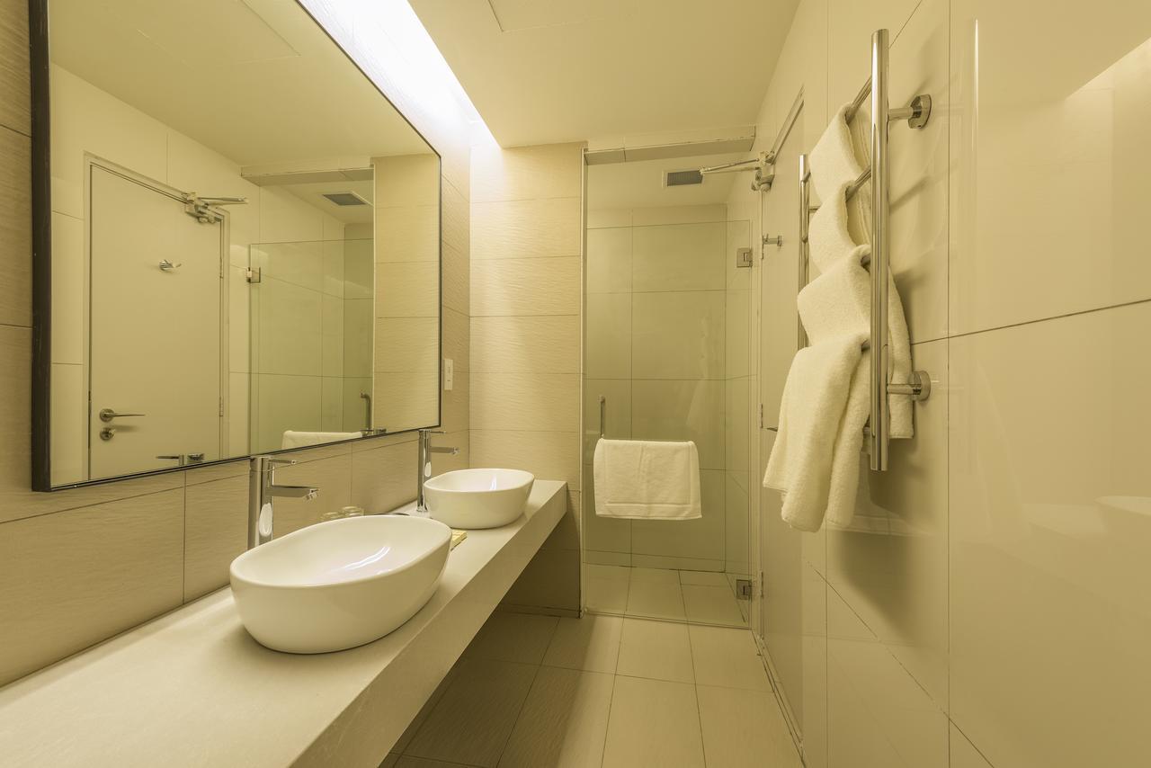 Jinhold Hotel & Serviced Apartment Мири Экстерьер фото