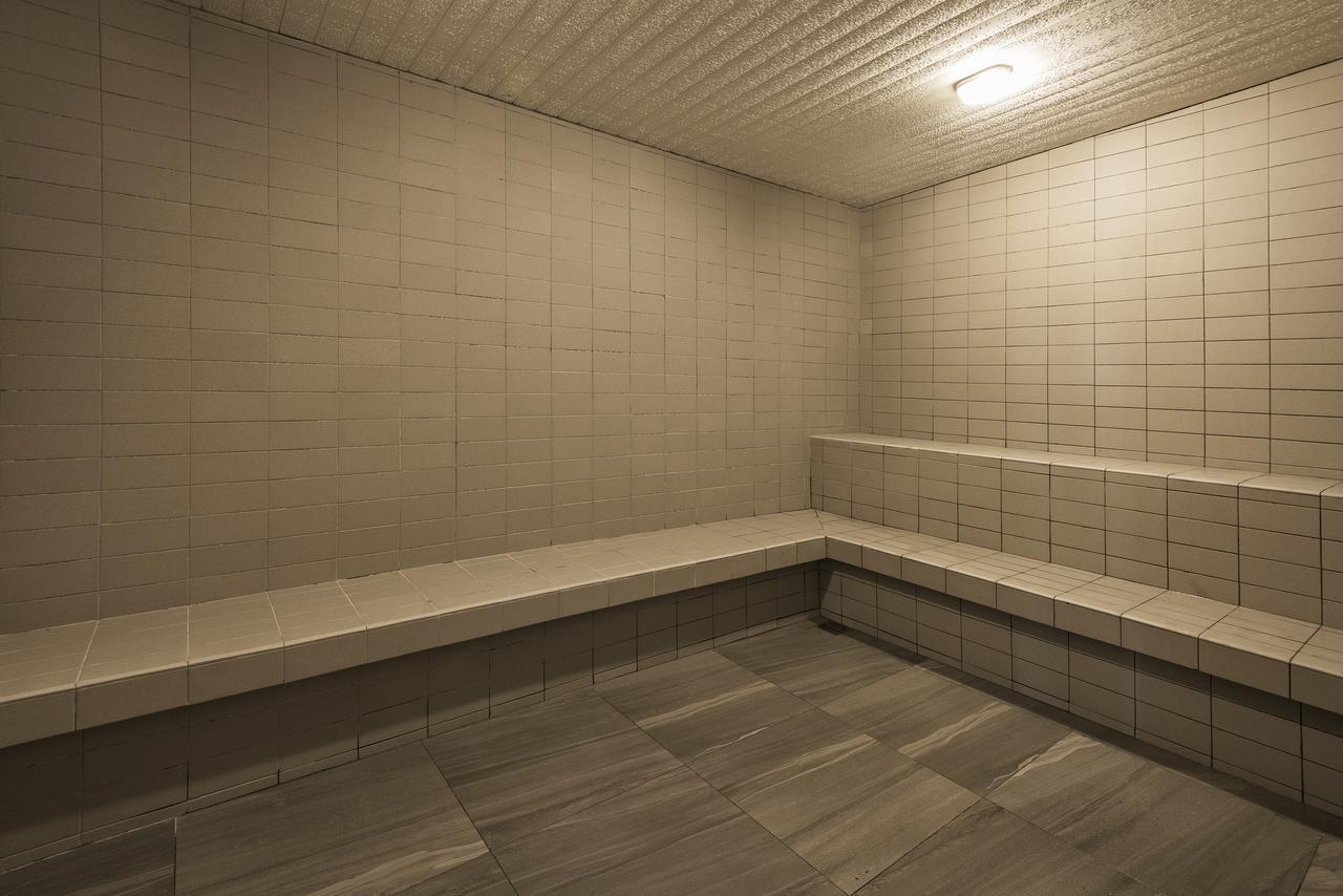 Jinhold Hotel & Serviced Apartment Мири Экстерьер фото
