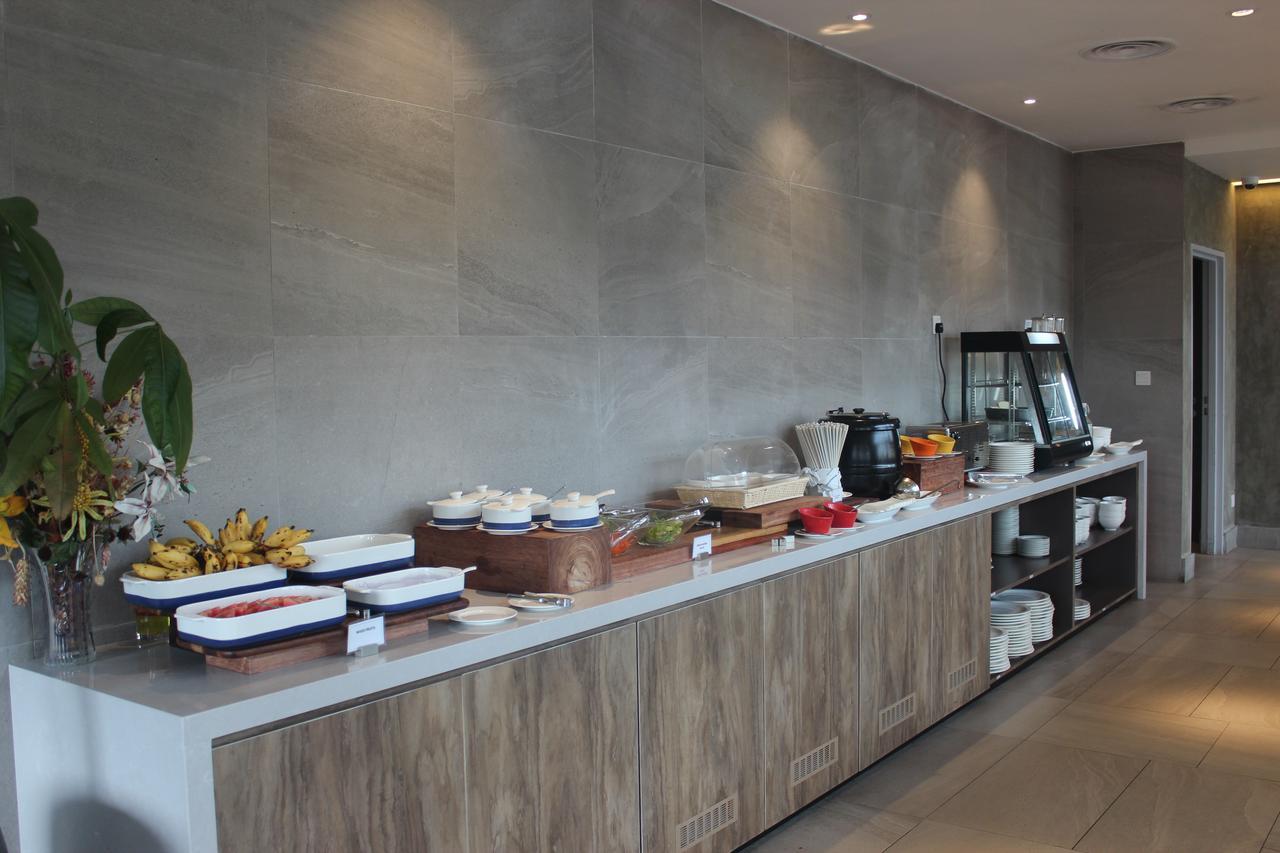 Jinhold Hotel & Serviced Apartment Мири Экстерьер фото