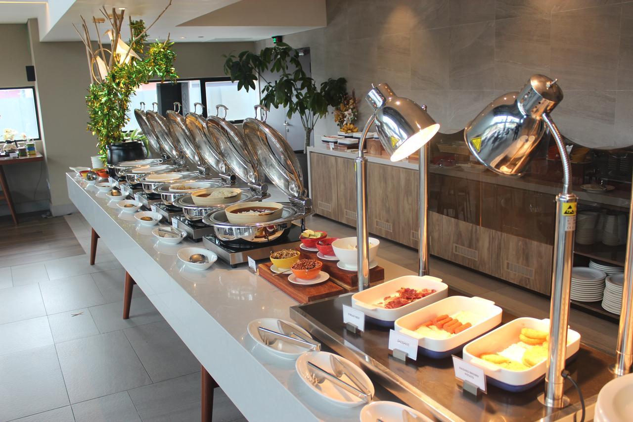 Jinhold Hotel & Serviced Apartment Мири Экстерьер фото