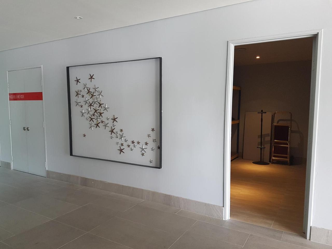 Jinhold Hotel & Serviced Apartment Мири Экстерьер фото