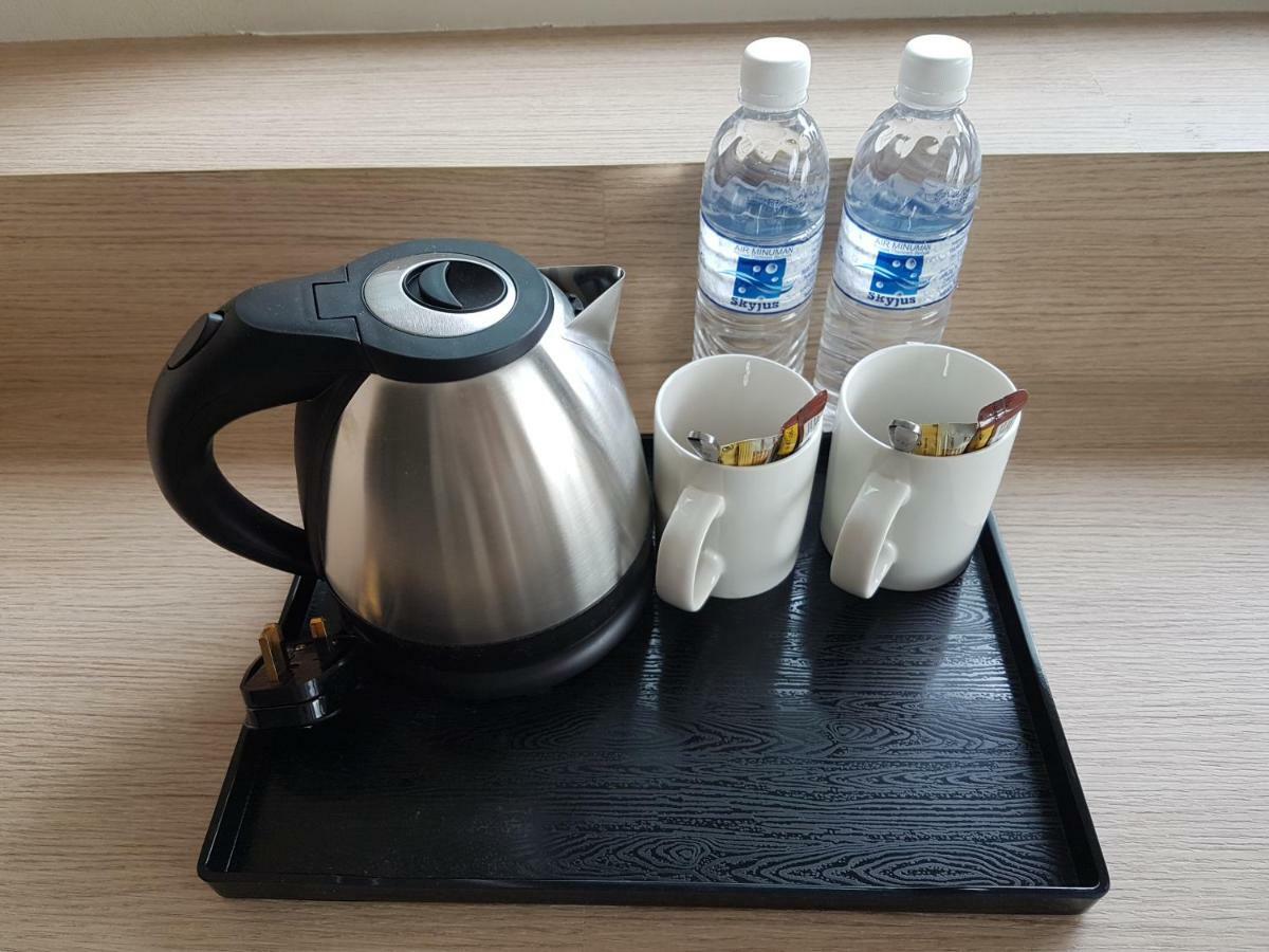 Jinhold Hotel & Serviced Apartment Мири Экстерьер фото