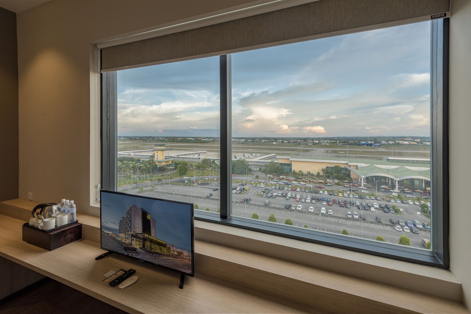 Jinhold Hotel & Serviced Apartment Мири Экстерьер фото