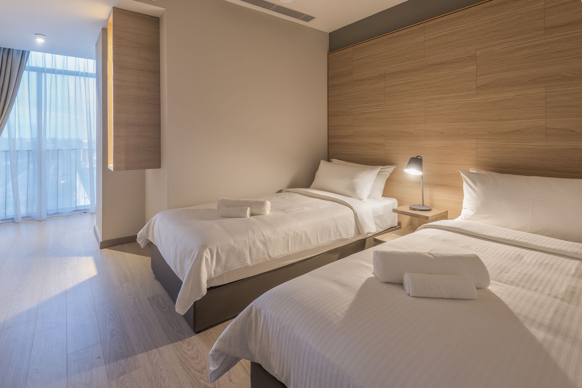 Jinhold Hotel & Serviced Apartment Мири Экстерьер фото